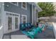 Charming outdoor patio with comfortable seating and an outdoor grill at 2921 W El Prado Blvd, Tampa, FL 33629