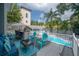 Pool with a view of the outdoor grilling area, bar, and seating at 2921 W El Prado Blvd, Tampa, FL 33629