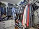 Organized walk-in closet with ample storage space for clothing and accessories at 3241 Cullendale Dr, Tampa, FL 33618