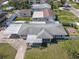 The home features an aerial shot of a quiet residential neighborhood at 4390 Cherry Ne St, St Petersburg, FL 33703