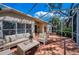 Enclosed brick patio perfect for outdoor relaxation and entertainment at 450 Liam Ave, Tarpon Springs, FL 34689