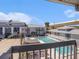 Community pool featuring lounge chairs and well-maintained landscaping at 4928 W Gandy Blvd # G203, Tampa, FL 33611
