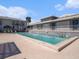 Beautiful condo pool with stairs; clubhouse is located next to the pool at 4928 W Gandy Blvd # G203, Tampa, FL 33611