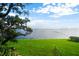 Scenic backyard with expansive lawn and waterfront views at 5010 Bayshore Blvd # 9, Tampa, FL 33611