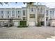 Charming townhomes featuring private garages, landscaped entrances, and brick paver driveways at 5010 Bayshore Blvd # 9, Tampa, FL 33611