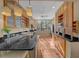 Bright kitchen features granite countertops and wood cabinets with stainless appliances at 5010 Bayshore Blvd # 9, Tampa, FL 33611