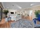 Spacious living room with a large rug, a modern console, and a seamless flow to other areas at 5010 Bayshore Blvd # 9, Tampa, FL 33611