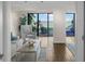 Inviting living room showcasing stylish furnishings and stunning water views through expansive windows at 5010 Bayshore Blvd # 9, Tampa, FL 33611