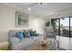 Cozy living room with comfortable seating and large windows showcasing water views at 5010 Bayshore Blvd # 9, Tampa, FL 33611