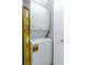 Efficiently designed laundry area with a stacked washer and dryer unit at 5231 Beach Se Dr # A, St Petersburg, FL 33705