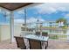 Covered patio boasts outdoor dining and scenic water views at 5231 Beach Se Dr # A, St Petersburg, FL 33705