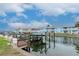 Picturesque waterfront view featuring docks and vibrant blue condominium buildings at 5231 Beach Se Dr # A, St Petersburg, FL 33705
