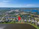 Beautiful aerial view of a lakeside community featuring attractive homes, green spaces, and tranquil water views at 5325 Sandy Shell Dr, Apollo Beach, FL 33572