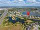 Expansive aerial view showcasing the community's lakes, green spaces and proximity to the highway at 5325 Sandy Shell Dr, Apollo Beach, FL 33572
