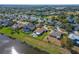 Backyard of home featuring a fenced yard, pool and outdoor dining area at 5325 Sandy Shell Dr, Apollo Beach, FL 33572