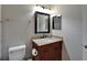 Bathroom with a neutral paint, single sink vanity, and toilet at 5325 Sandy Shell Dr, Apollo Beach, FL 33572