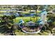 An aerial view of the Harbour Isles entrance, featuring a waterway and lush landscaping at 5325 Sandy Shell Dr, Apollo Beach, FL 33572