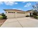 Charming home featuring a two-car garage, landscaped yard, and a well-maintained facade at 5325 Sandy Shell Dr, Apollo Beach, FL 33572