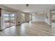 Open floor plan leading to screened patio with view of the lake at 5325 Sandy Shell Dr, Apollo Beach, FL 33572