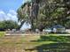 Enjoy a friendly game on the community bocce ball court, with plenty of seating and lush landscaping at 5403 Comanche St, Zephyrhills, FL 33542