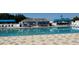 Cool off in the sparkling community pool, complete with a lifeguard stand and plenty of space for swimming at 5403 Comanche St, Zephyrhills, FL 33542