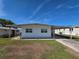 Charming single-story home featuring a covered parking area at 5403 Comanche St, Zephyrhills, FL 33542