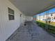 Inviting patio area, perfect for outdoor dining and relaxation at 5403 Comanche St, Zephyrhills, FL 33542
