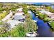 Breathtaking view of canal-front living with lush landscaping and waterway access at 809 30Th E Ct, Bradenton, FL 34208