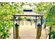 View of the dock featuring black pylons and a gazebo, providing an idyllic space for relaxation at 809 30Th E Ct, Bradenton, FL 34208