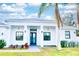 Beautiful single-story home with modern design, complemented by lush landscaping at 809 30Th E Ct, Bradenton, FL 34208