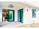 Outdoor patio area with sliding glass doors to access the kitchen and backyard at 809 30Th E Ct, Bradenton, FL 34208