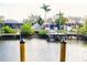 Scenic waterfront view with private docks and boat access, creating the ideal relaxing outdoor oasis at 809 30Th E Ct, Bradenton, FL 34208