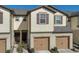 Charming townhouse with neutral siding, complemented by two-car garage at 9208 Hillcroft Dr, Riverview, FL 33578