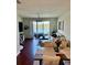Inviting living area featuring a seamless flow to the outdoor patio and lake view at 9208 Hillcroft Dr, Riverview, FL 33578