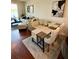 Living and dining areas are decorated with neutral tones and natural light from the large window at 9208 Hillcroft Dr, Riverview, FL 33578