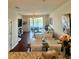 Inviting living space with lake view, seamlessly blending indoor and outdoor at 9208 Hillcroft Dr, Riverview, FL 33578