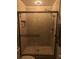 Shower features stylish tile, stone accents, and a seamless glass door at 9208 Hillcroft Dr, Riverview, FL 33578