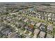Aerial view of neighborhood, showcasing property's location at 9244 Bella Vita Cir, Land O Lakes, FL 34637