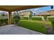 View of backyard showcasing healthy green grass and landscaping at 9244 Bella Vita Cir, Land O Lakes, FL 34637