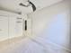 Bedroom featuring neutral carpet, ceiling fan and sliding door closet at 9244 Bella Vita Cir, Land O Lakes, FL 34637