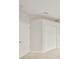 Bedroom featuring neutral carpet and double door closet at 9244 Bella Vita Cir, Land O Lakes, FL 34637