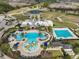 Aerial view of community pool and surrounding amenities at 9244 Bella Vita Cir, Land O Lakes, FL 34637