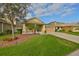 Charming single-Gathering home with a well-manicured lawn and inviting curb appeal at 9244 Bella Vita Cir, Land O Lakes, FL 34637