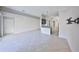 Spacious living room boasts tile floors, and a breakfast bar that connects to a modern kitchen at 9244 Bella Vita Cir, Land O Lakes, FL 34637