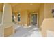 Inviting covered front porch with neutral paint, offering a welcoming entrance at 9244 Bella Vita Cir, Land O Lakes, FL 34637