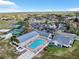 Aerial view of community amenities featuring a pool, clubhouse, and recreational areas at 10736 Keys Gate Dr, Riverview, FL 33579