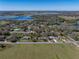 Enjoy the scenic beauty of this home nestled near tranquil lakes and lush greenery, under the sunny sky at 10925 Fort King Rd, Dade City, FL 33525