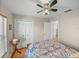 Warm and inviting bedroom with a large closet and neutral wall color at 10925 Fort King Rd, Dade City, FL 33525