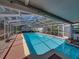 Discover this refreshing private pool with screened enclosure, perfect for year-round enjoyment at 10925 Fort King Rd, Dade City, FL 33525