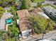 Aerial view of the home showing the roof and surrounding trees at 1520 15Th N St, St Petersburg, FL 33704